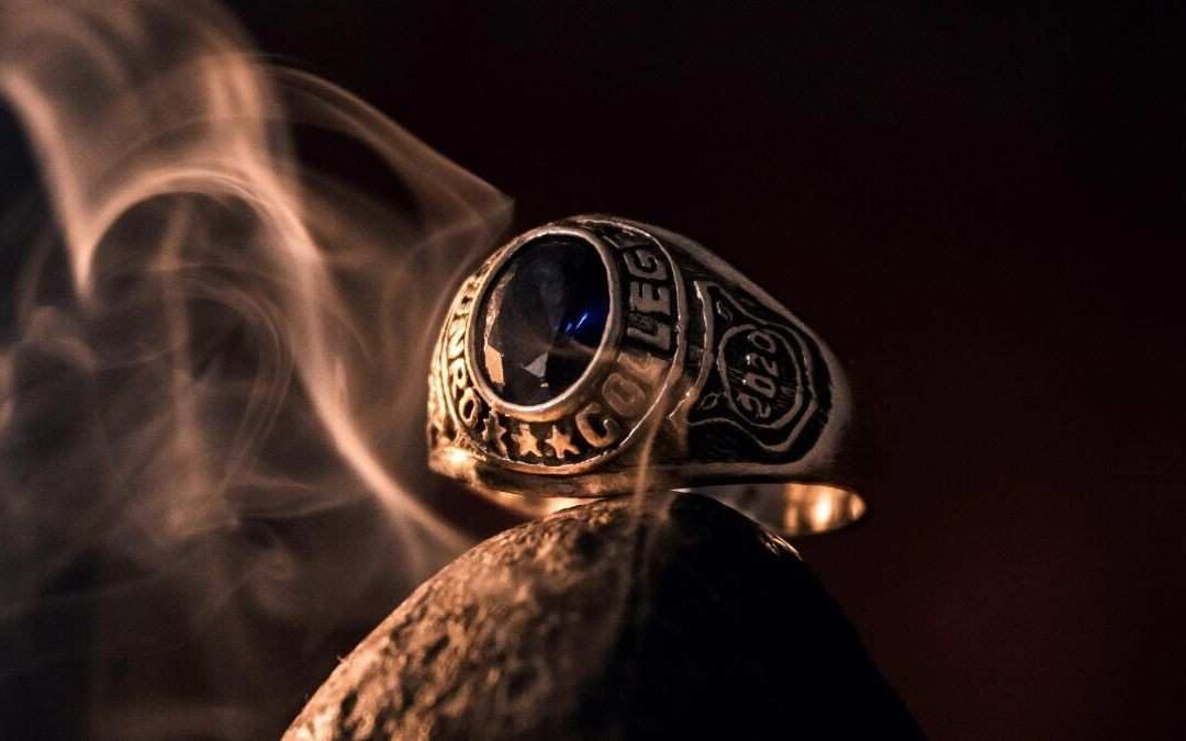 Authentic Djinn protection ring and ancient manuscript for spiritual shielding.